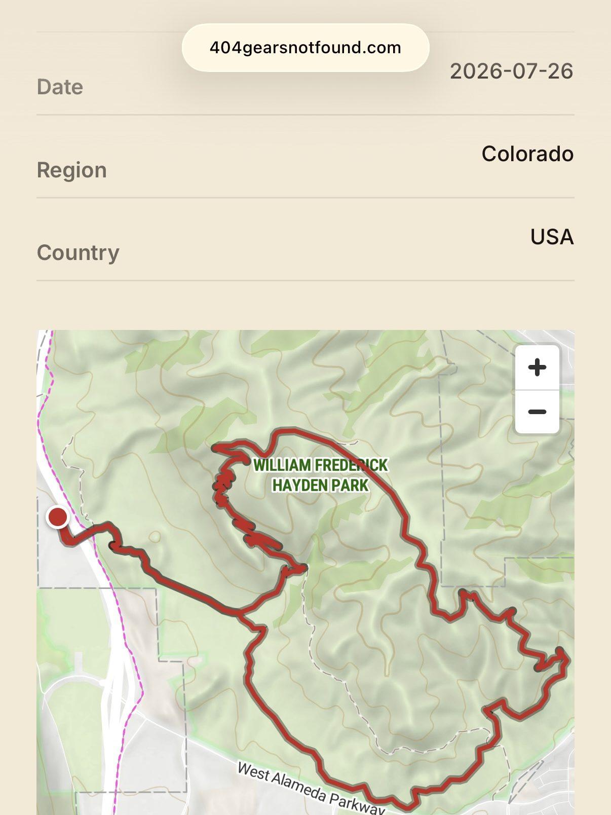 Screenshot of a route page on 404gearsnotfound.com showing an interactive topographic map with a red loop drawn through William Frederick Hayden Park in Colorado, above rows listing the date, region, and country