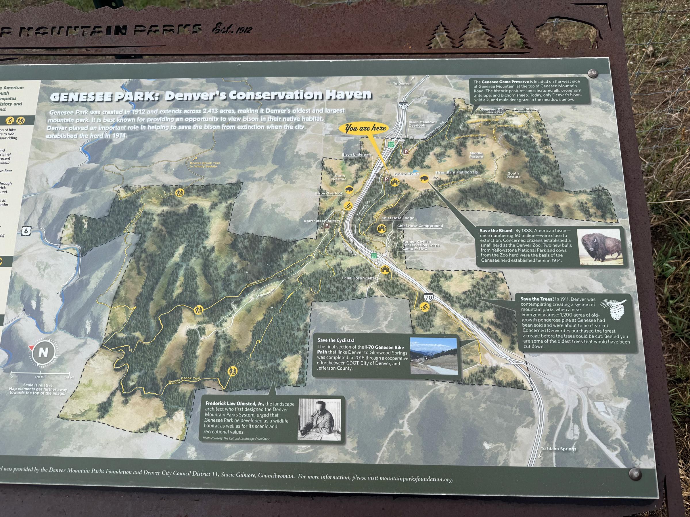 Denver Mountain Parks interpretive sign describing Genesee Park's 1912 founding and its bison conservation history