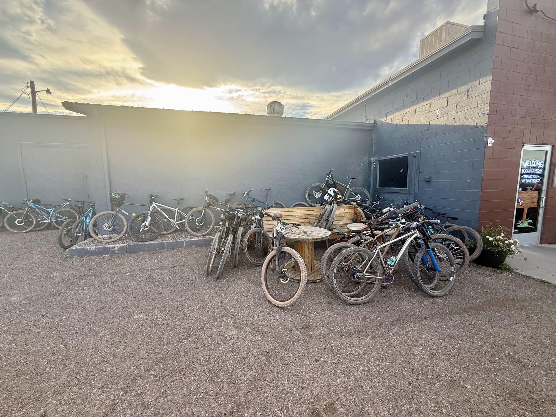 Bikes racked outside a building at sunset in Richfield, Utah