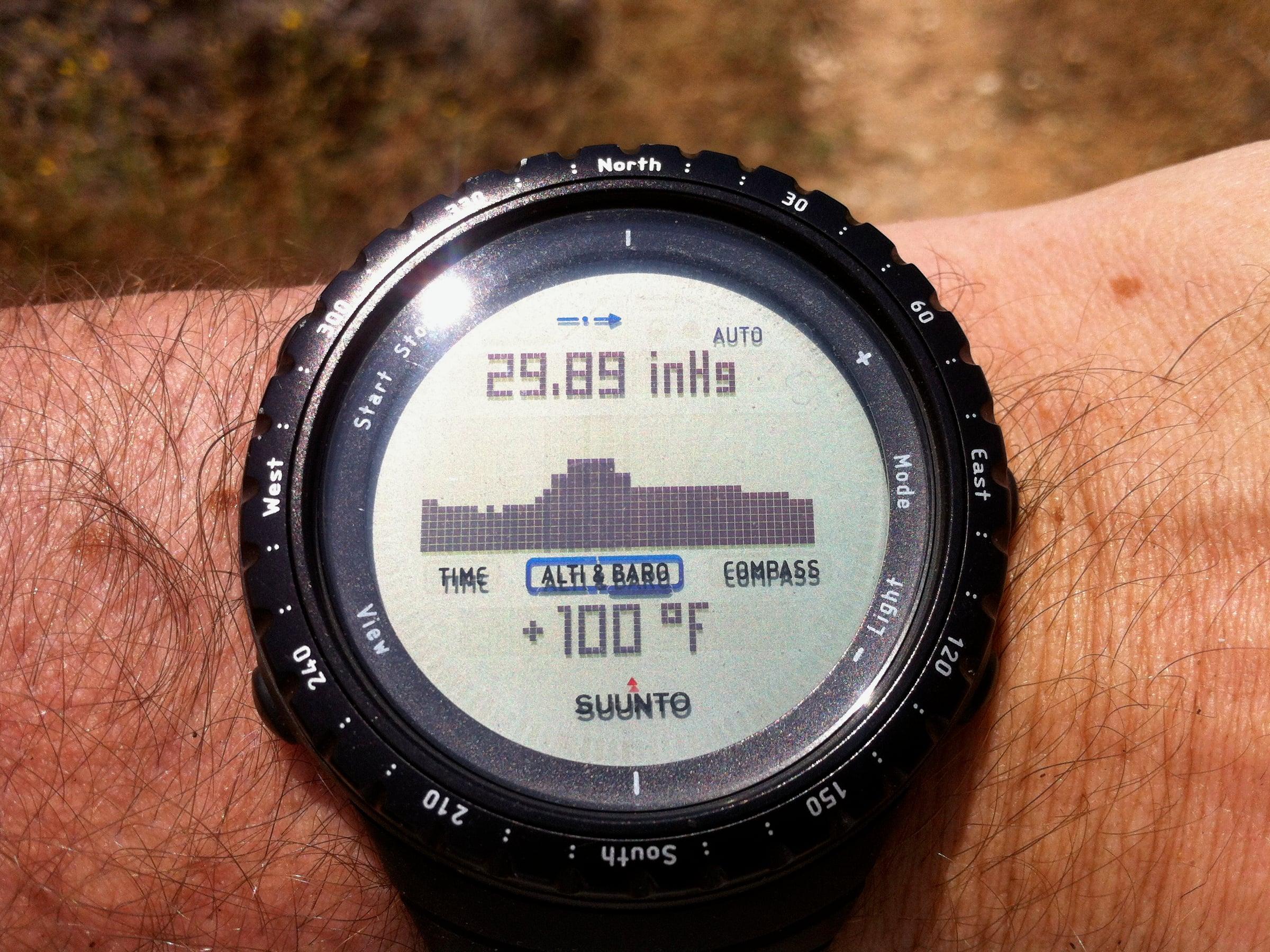 The Suunto Core's barometric pressure trend graph, screen close-up outdoors